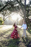 I bought this dress for my engagement photos and it was absolutely perfect. It fits true to size, but since it is a wrap dress you can make it tighter or looser as needed. The material is thick and well made with vibrant colors. The ruffle detail on the sleeves add such a cute touch. Love this dress and will continue to wear it!! - Jaclyn