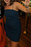 Ordered this for outdoor graduation event. I ordered both a small and medium. As with many dresses for me, the small was too tight across my butt/thighs. Because all the straps are adjustable, I ordered a medium and it works great! I love the color, and the material is different from what I expected but I like it. Works great with a sticky bra or no bra. You could dress it up with heels or down with sandals! - Megan M.