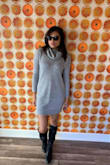 Im an xs and it fits true to size. It has a great lose look but doesnt look too big. Grey is perfect color to pair with different boots. Its comfy & warm but not too hot if the weather warms up through day! - Heather E.