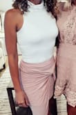 Very comfortable, thick material, you can dress it up or down. I wore the top with a wrap skirt for my bridal shower and got so many compliments. Definitely recommend the top. - Sabrina M.