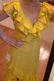 It fits perfectly in my body, although it is long for me. I usually get medium sizes but I'm glad I read the reviews so ordered the xs size on this dress. I'm going to wear it on my husband's 50th bday! - Sally F.