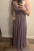 It looks like a much more expensive than it is! It is a little large in the top for me but otherwise the fit is perfect. Purchased as a bridesmaid dress. - Monica C.