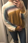 Super cute sweater! Have gotten many compliments on it. It's soft and comfortable! It's not a heavy sweater which I typically like. It's thinner but still really cute and does keep me warm. - Micaela S.