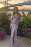 i wore this to my friend's wedding as a guest and got so0o0o many compliments. Not only does the dress look good but it was so comfortable for a long night of dancing, it some stretch to it and I didn't have any issues with the top sliding down. I wore with 3" heels and didn't drag on the floor. Can't wait to wear this to another party! - Erica R.