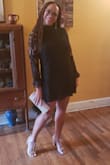 This is the perfect little black dress! It has personality and charm from the lace sleeves to the delicate ruffled neck line and wrists. 
True to fit and constructed beautifully.
Wore to an evening wedding and a 50th birthday party, this dress was a hit at both events - Renee O.