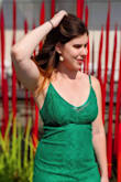 I absolutely love this dress. I have some curves on the bottom area and the dress hugged them perfectly without bunching or riding up. Although it was a little loose on top, the adjustable straps helped the fit a lot. - Katy W.