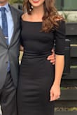 I wore this dress to a wedding. I loved the longer length and it hugged in all the right places. The stretch was great for dancing and I could still move my arms above my head which is hard to find in off the shoulder looks. - Amber L.