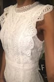 I purchased an xs and it's perfect. Not too tight or too short. Saw the same dress at Nordstrom for a lot more. - CHARMAINE F.
