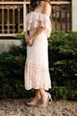 This dress is absolutely gorgeous!  It's very flattering as well.  Absolutely love it. - Tina S.