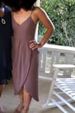 This dress was perfect for a fall wedding! I saw lots of reviews that said to order a size smaller than normal, but I was nervous to order an XS when normally I'm a small or even a medium because I have a big butt for my size. I ordered an XS and S and the XS fit me perfectly so I sent back the small! I didn't need to wear a bra because it fit me perfectly around the rib cage and bust so that was a plus! The dress came within 3 days and returns were super easy. My only issue was that the slit in the dress goes all the way up to waist, so dancing or sitting could be revealing if you're not paying attention. I just used some clear double sided tape to keep it together and that worked well enough, but if I had more time I would maybe take it to a seamstress. - Rebecca T.