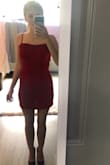 Honestly I felt like I was in velvet lingerie instead of a red dress. The neckline is ridiculously high and for some reason the pictures of the model made me think otherwise. Should have gotten an XS but regardless I hated the neckline and how loose it was. - Elisabeth B.