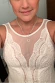 I love the detail of the top, the cleavage is not too much, just enough to show! - Gloria V.