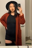 The universal Chunky Cardigan. My go to piece. I wear this EVERYWHERE and have managed to create multiple outfits with just one piece! Super warm, NOT scratchy at all but a tad bit heavy. - Ileana P.