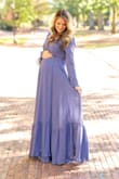 So beautiful and thick quality material. I wore this dress 7 months pregnant, 145 lbs, 5'5". Wore for my maternity pictures and it worked perfect!! I probably could have fit in a small but sized up just in case. It was just a little too loose in my arms. - Casey S.