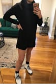 I'm usually between a small and a medium and read that it runs a little big, so ordered a small. It fits great! It's on the shorter side since I have long legs, but still appropriate. Arms are fitted but not uncomfortable. I think I'm going to wear it a lot this fall!! So excited! - Clarke L.