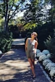 I love this romper it looks great and is easy and comfy to wear. Only downside is that it gets very wrinkly so ironing is necessary. - Janie W.