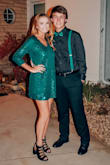 Ordered this in two sizes not knowing how loose a fit it would be. Went with the XS size but the S would have been ok too just a bit longer.  More of an emerald green which is the color I was hoping for. Quality made and didn't feel flimsy. Has a nice liner so no scratching from sequins. - Jamie M.