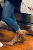 Love these booties! They seem to run slightly bigger. I usually wear an 8 but ordered a 7.5 and they are perfect. - Sarah G.