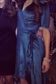 Love the fit of this dress so much!! Received many compliments! Perfect for a fall/winter wedding! I usually buy a small, but since it was a wrap style the XS was perfect! - Dana W.