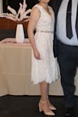 I wore this dress to my town hall wedding and it was perfect. The lace makes it very romantic and I just added a sash that I bought online and nude shoes. I received a lot of complements and I totally felt like a bride. I have to admit that I removed the tulle from the skirt cause it made it too puffy. - Carla E.