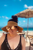 I have a large head And it is soooo hard to find woman's beach style hats that fit me. This one was AWESOME!! It has Velcro on the back to adjust sizing. It's super flexible and kept its shape. Perfect beach hat for me. Loved it. - Makenna M.