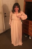 The dress wasn't bad, but it didn't feel special. I'm short and super curvy, so it ended up looking like just too much material while having a way too high of a slit. Haha! I have huge boobs, so the cut made it where either I find something to go under it or I pin it closed - however, since the waist line is lower, if I pin it closed it just made me look grumpy and took away from my figure. Aka, I ended up returning it cause I would have to fix too much in order to make it work for me. Would look great on someone taller and 'longer' for sure. :) - Kassi E.
