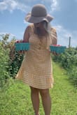 Lightweight, fun summer dress! I ordered a size XL and it fit nicely. Material is thin so choose color of underwear carefully. Perfect for a hot sunny day. - Brenna G.