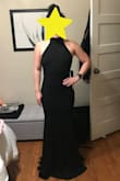 I bought this dress to try on as a bridesmaid option in an upcoming wedding (I'm MOH). The bride didn't end up liking it (didn't want black and wanted a slit), but it fit really well and was pretty comfortable. It definitely fits true to size; however, it was obviously long on me, as I am very short. Additionally, the buttons on the halter strap are a little tricky to do yourself. The fabric is nice, but a little heavy, so I wouldn't recommend it for a hot venue. It was also pretty roomy in the chest area, but I don't have much to work with to begin with. If I had extra money/needed a classy event dress, I would definitely have kept it! - Stephanie D.