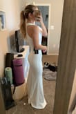 Truly loved this dress, I wanted to keep it but the material was too cheap looking and I was buying it for my elopement. I think I'm the black or turquoise you wouldn't be able to notice, but very noticeable in the white. - Emily F.