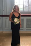 The fabric is stretchy, but secure. The dress is comfortable and looks great. I had to get it shortened, but that's common for me. I'm typically a size 6 or 8 and the medium fit well. - Maggie B.