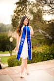 THE DESIGN ON THE BACK IS GREAT! I love the design, and pretty much every thing about this dress EXCEPT the top and back is a bit loose. It also felt a bit long -- BUT that's because I'm short :) Ordered it for my grad photo shoot! - Karmen Y.