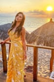 I bought this dress for a wedding in Puerto Vallarta, it runs a little large but it was still pretty. I'm about average height and heels was a definite must because it's also quite long. Overall very pleased with it. - Veronica F.