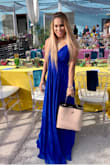 It's very long but the fit is perfect. Very flowy and heavy but I got so many compliments. - Kathlyn S.
