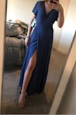 This is the perfect dress for a wedding or a fancy night out. The color is great, not see through at all. The wrap feature is amazing, you can make it as tight as you need it and you can cover your chest as much or as little as you want. The slit is also great. Not too revealing. I want this dress in all the colors! - Alena M.