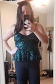 Love the top can't wait to ring in the new year with this outfit!! Super comfy, not scratchy at all! Such a pretty color as well. Love the green! - Mai N.
