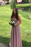 Absolutely loved this as a bridesmaids dress. I ordered a small after originally trying a medium. I have a smaller upper body, 32C and the small fit perfectly up top, I did not wear a bra underneath. The medium was too big. The adjustable straps were very helpful. I was worried about my larger hips and bottom in the small but I thought it was actually very flattering. I also had it hemmed a couple of inches to wear it with flat sandals. I would be careful with the lace design up top and the outer tulle on the skirt, those were a couple of fragile spots, otherwise, all the fabric and design was great! - Madison T.
