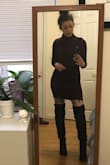 This just arrived in the mail, and I had to try it on immediately. I was so happy with the color, (it's a deep plum- it's hard to tell in my photo bc of the lighting) and it's super cozy and soft. I'm normally an XS, but ordered a size S because of previous reviews I read. I'm super happy I sized up, because it is a form-fitting dress and snug! It's really cute. Def recommend it - Rivka G.