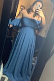 I asked the fit expert what size I should order in this dress and based off my weight and bust, they suggested a XL. After reading reviews that said it runs large and is a little top heavy, I went with my gut and ordered a Large. It fits great!! It is very stretchy so has plenty of room if you size down based on the size chart. The top is heavy and may slide down if you don't order the correct size. The only weird thing about this dress is the cups in the bust. You can see the outline so I need to figure something out before my engagement pictures! It is also very long, and I will be needing to get it tailored. Even with heels it drags too much. But the fit is very flattering! You wont be able to lift your arms much but I'm just using this dress for pictures so it isn't a bother to me. I recommend this dress! (Not wearing shape wear or bra in picture) - Jessica K.