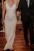 This was just what I was looking for for my wedding! Simple and beautiful, easy to put on, easy to dance in. The fabric is thick, not too see-through, and has a little stretch which was nice for some last-minute weight changes. The tiniest bit loose in the bust (but I'm pretty small there). To wear flats I got it hemmed about 2". - Hannah H.