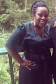I wore this dress to a friends wedding and it fit perfect and I got lots of compliments. Has a nice shimmer to it. The only thing is it is a faux wrap, so cleavage might show/you might have to pin that area a little.  I'm short and curvy and the XL fit perfect. Love this dress. - Letam D.