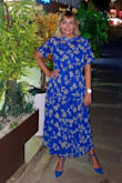 Very beautiful dress. Amazing color. I am very pleased with my purchase. - Elena M.