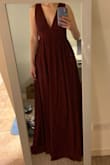 Loved the style and color. Very long, which meant I could wear heels even though I'm tall! Note that the sizing in the chest was a bit inconsistent with another color I ordered. I returned it since the top felt too exposed for the conservative black tie wedding I was going to, but would totally order again for a different event. - Megan L.