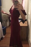 I really like this dress. It's form fitting with super thick and stretchy material. I'd say size down if you want it to be tight unless you have a large bust. - Ariel B.