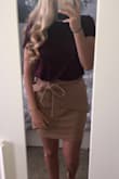 This skirt is amazing. Pairs well with almost any shirt and can be dressed up so easily! Not too tight either. I get so many compliments!! - Emma F.