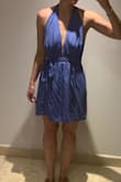 This dress is beautiful, wrinkles easily but nothing a steamer can't fix.  I wore this for my wedding reception as something blue. - Nicole M.