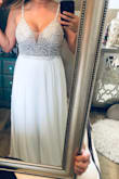 This dress is perfect, and feels/looks more then what you pay for it. I originally ordered a size 8 (against the advice that if you have a bigger bust size up). They body of the 8 fit, however the upper area was tight. I ended up returning for a size 10 and it's slightly large, however much more comfortable! All around I'm super please and no alterations will be needed. - Alecia B.
