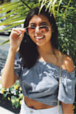 The actual length is just enough to cover my midriff but also looks great tied up for a cute crop top look. Perfect look for summer! - Valerie T.