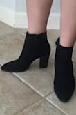 I was surprised how roomy these boots are on my wide feet. I have bunions on my feet and was concerned these wouldn't fit but they do even with socks. I'm goin back to order the tan one - Natalie T.