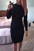 I'm returning this dress ONLY because it was 1 of 3 options and I made myself only keep 1! The material feels like a sweater and does a pretty good job of smoothing cellulite. This dress actually feels pretty warm because of the thicker fabric. I have a small waist and big booty and this hugs the curves so well. I'm 5'9", 150 lbs and the medium fit perfectly. - Abigail B.