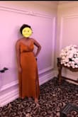 This dress was perfect for a fall wedding. The color was a beautiful rust and the split showed a tasteful amount of leg. My only (minor) complaint was that the top was a little large on me so I had to pin it in place. Overall I loved it and got a lot of compliments! - Asyia F.